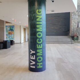 Building pillar wrapped with graphic at Ivey