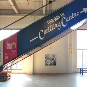 Escalator digitally printed graphics for events at 100 Kellogg