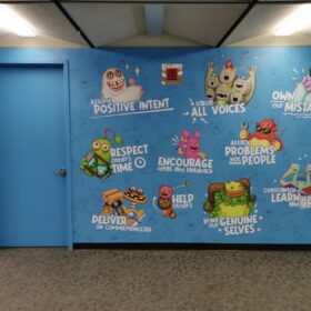 Company values cartoon wall display for Big Blue Bubble